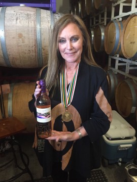 Olympic gold medalist Peggy Fleming shows off the Victories Rose. 